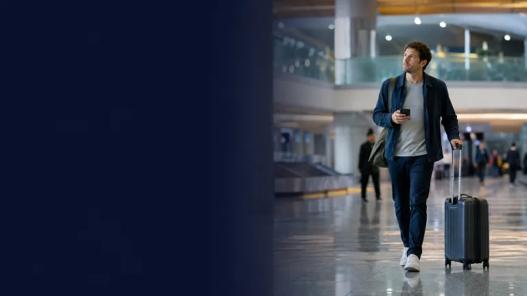 International visitor arriving at a China airport with luggage and a phone